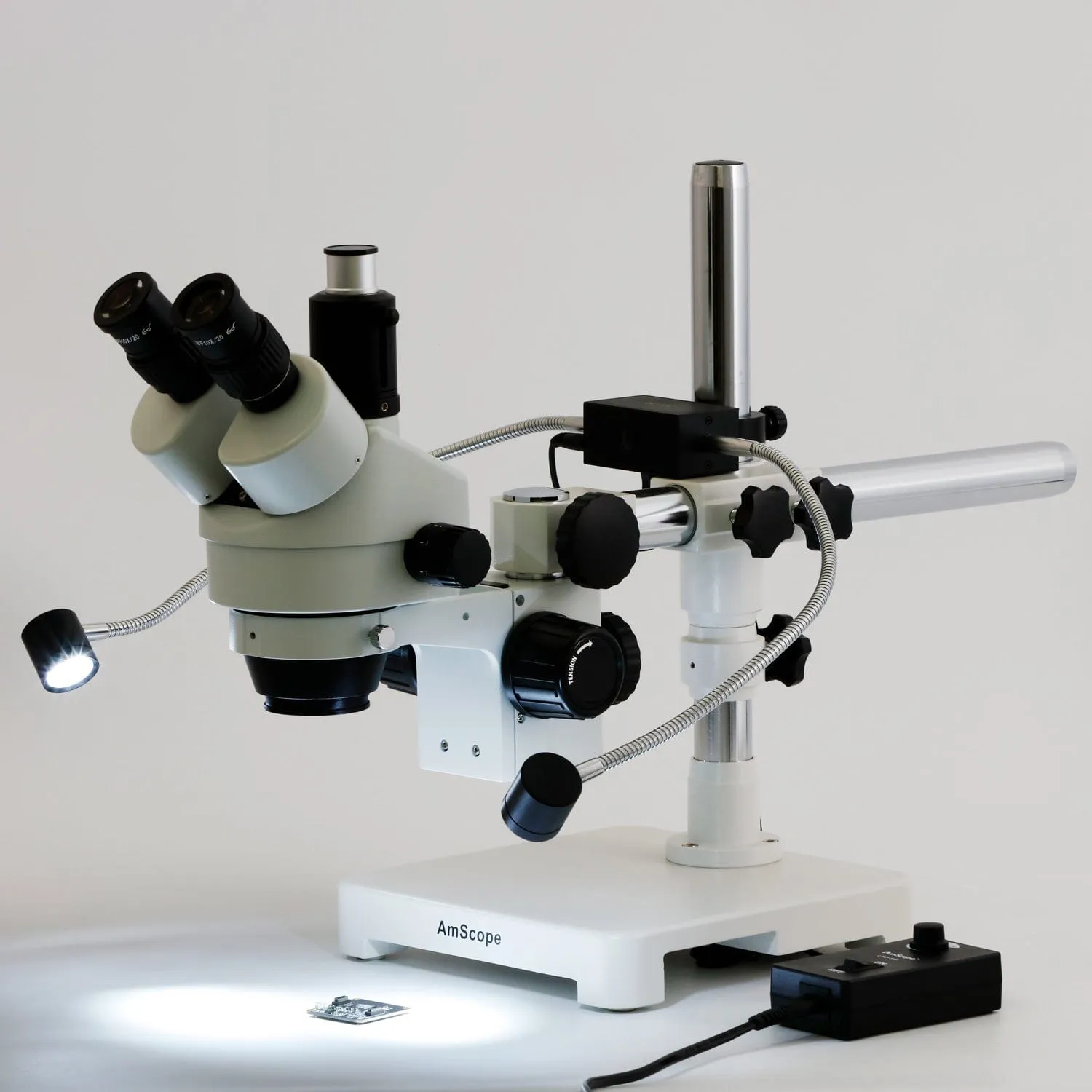 AmScope SM-3T Series Trinocular Simul-Focal Stereo Zoom Microscope 7X-45X with 8W LED Dual Gooseneck Illuminator   Optional Digital Camera on Single Arm Boom Stand