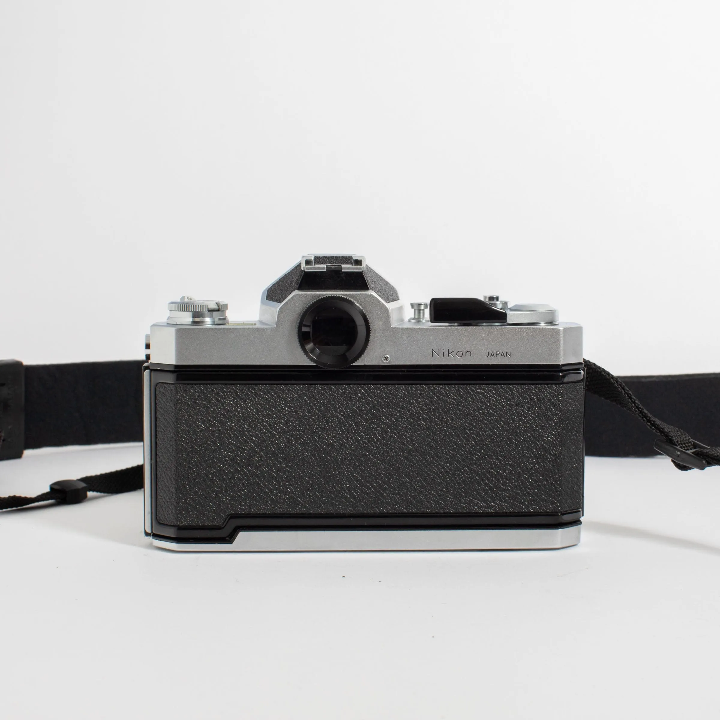Nikkormat FT2 with Nikkor 50mm f/2 Lens and camera strap