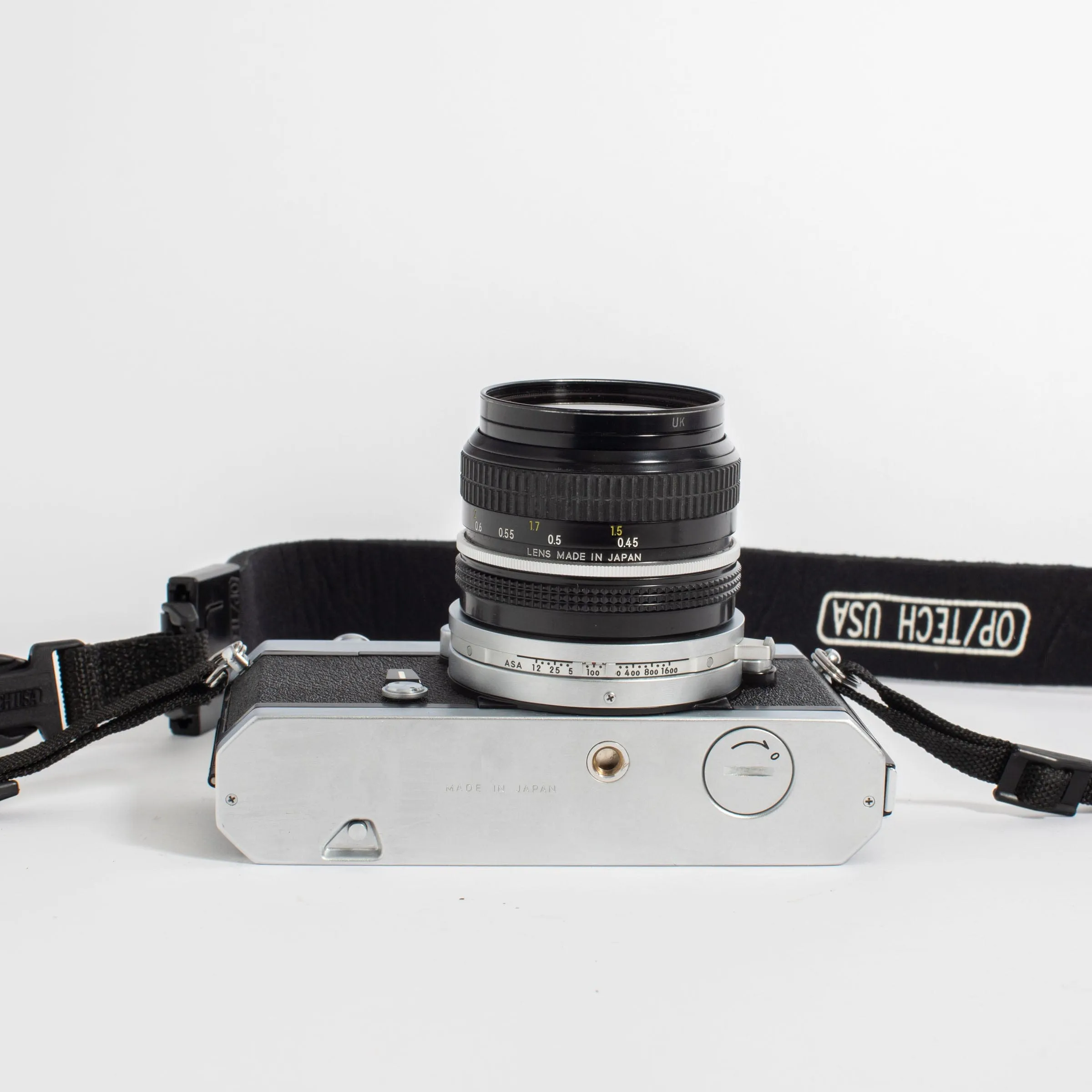 Nikkormat FT2 with Nikkor 50mm f/2 Lens and camera strap