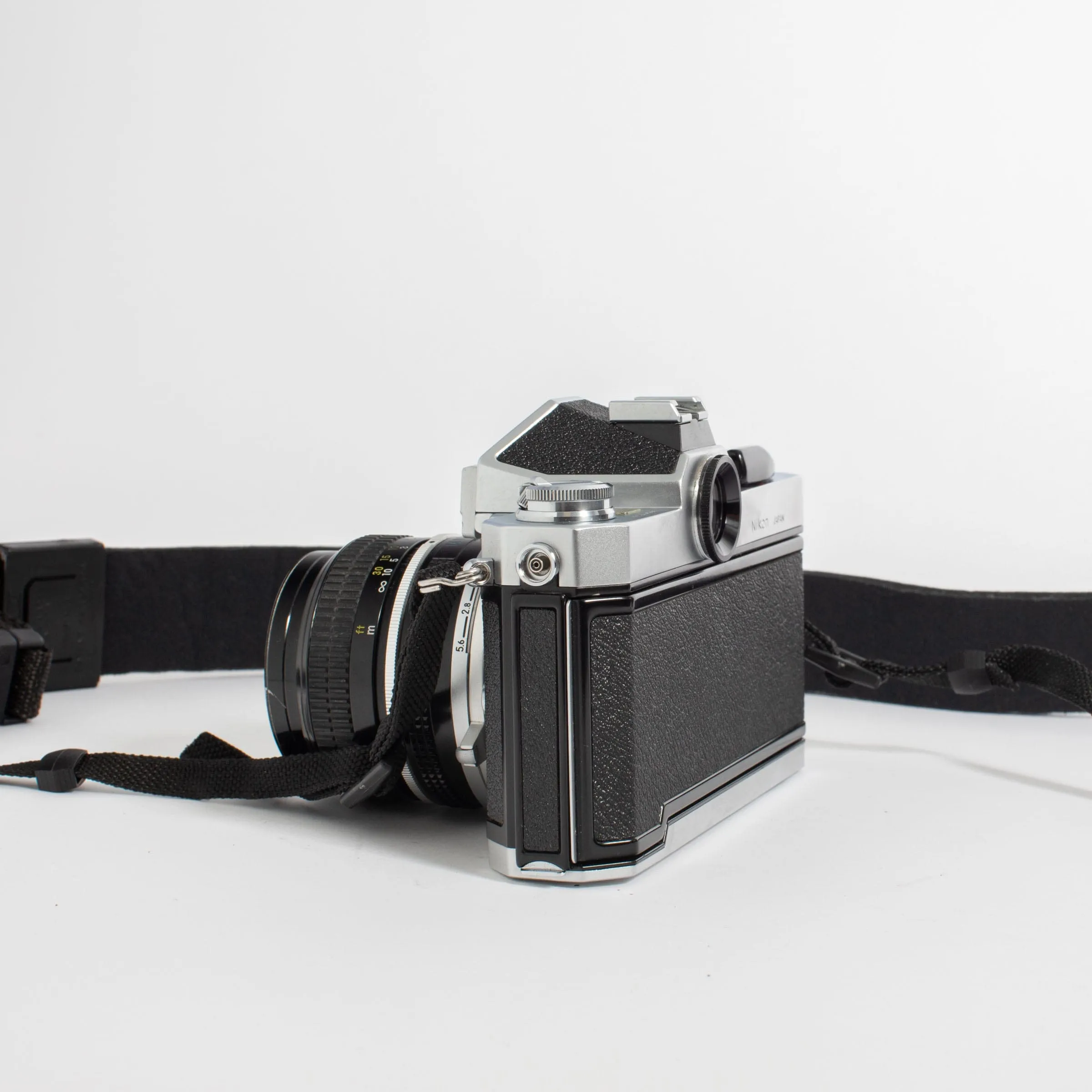 Nikkormat FT2 with Nikkor 50mm f/2 Lens and camera strap