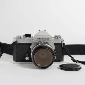 Nikkormat FT2 with Nikkor 50mm f/2 Lens and camera strap