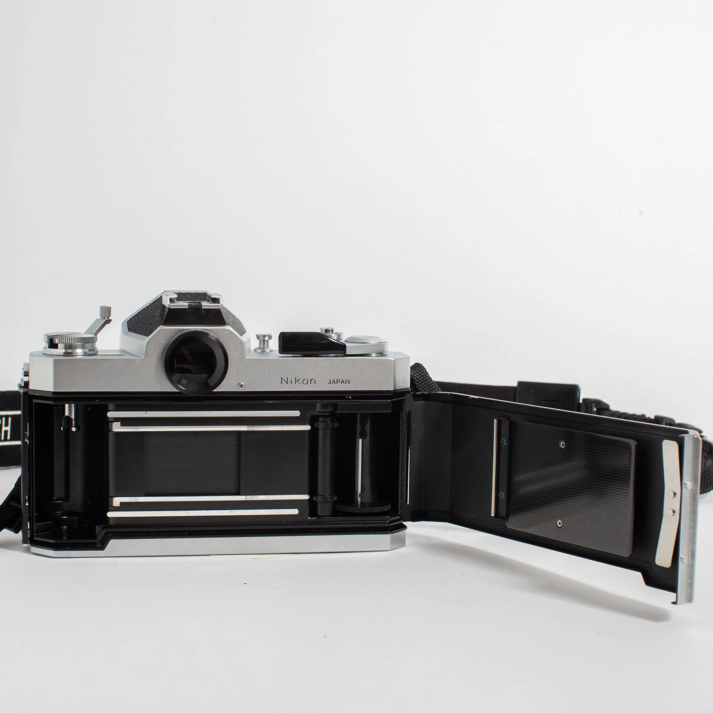 Nikkormat FT2 with Nikkor 50mm f/2 Lens and camera strap