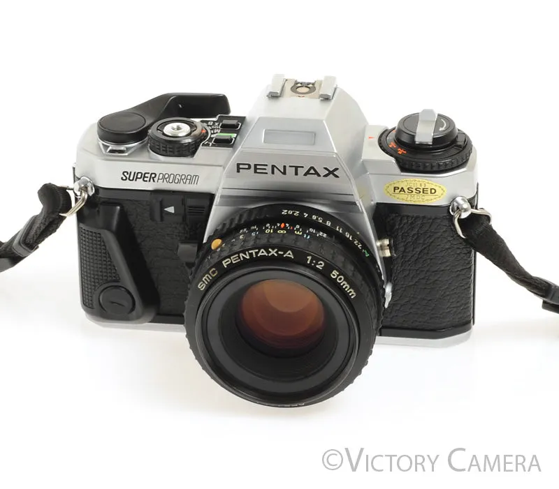 Pentax Super Program Chrome 35mm Film Camera w/ 50mm F2 Lens -New Seals-